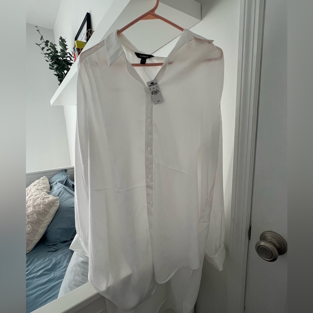 Oversized women’s button up blouse.